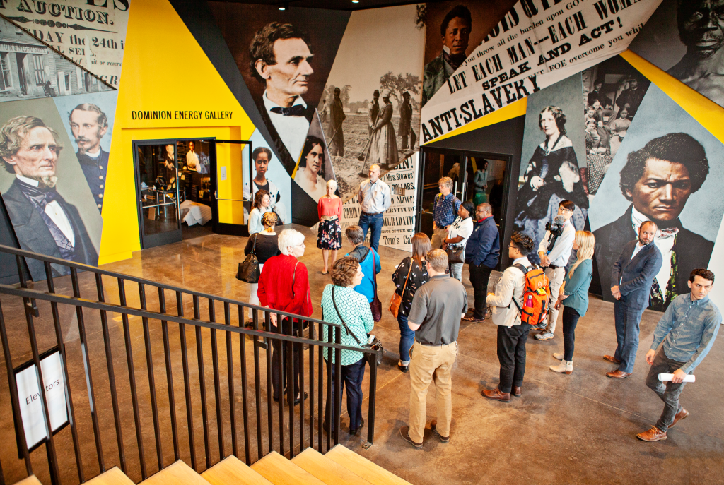a group of people inside a civil war museum