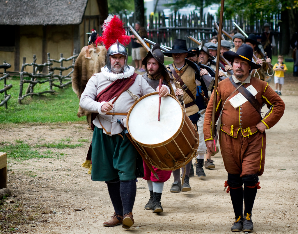 17th century reenactors marching and drumming