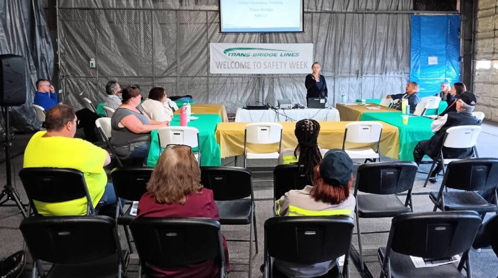 A representative from New Jersey Manufacturers Insurance Company presents the Trans-Bridge
Lines staff with vital information to avoid slips, trips, and fails on the job and at home.